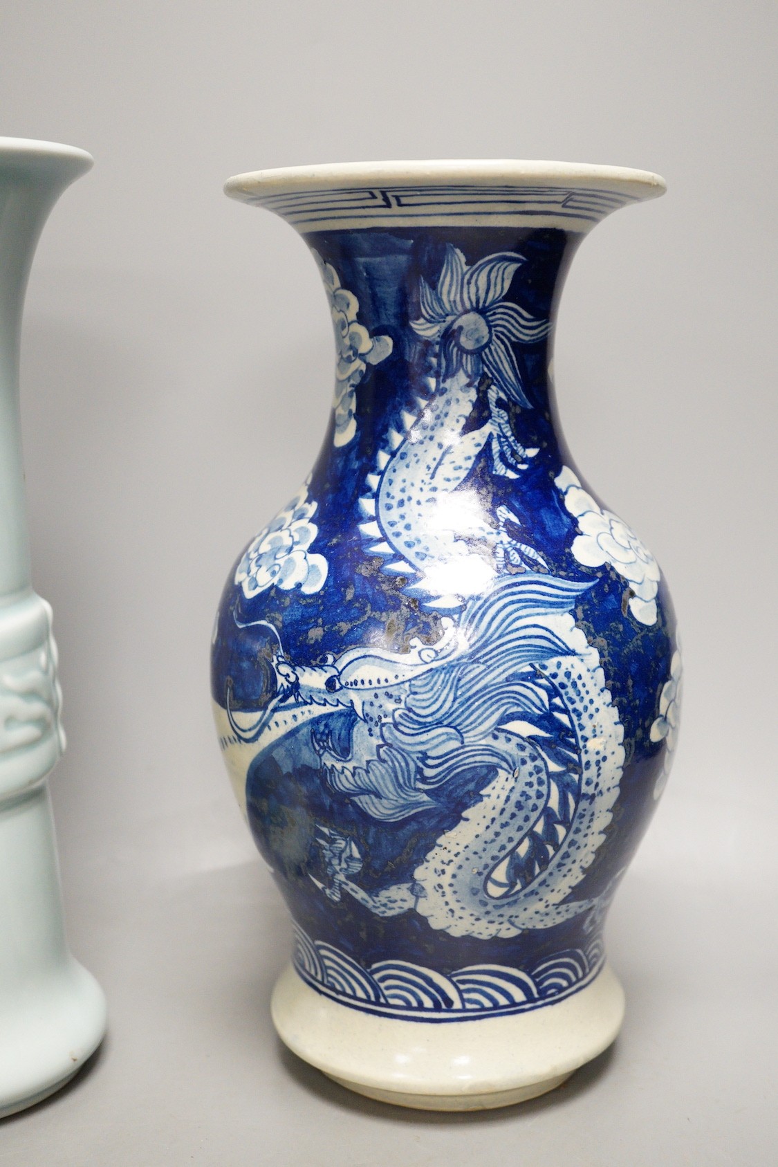 A Chinese blue and white vase, two jars, a beaker vase, a double gourd vase and a pearlware vase, tallest 31cm